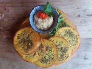 FARINATA
Originally a peasants dish from northern Italy. Baked individually from ground chickpeas with crisp, salty samphire and served with a warm aubergine purée at Nico's Kitchen and Lounge in Hastings