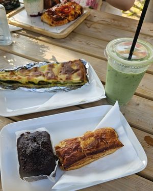 Spinach and onion pastry, iced matcha latte, vegan "brownie", and vegan sausage roll at Het Zaanse Bakkertje / Dutch Vegan Bakery in Zaandijk