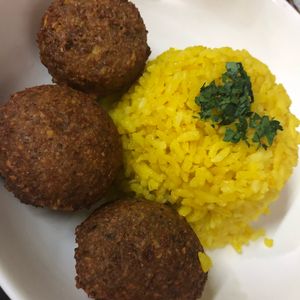 Falafel with yellow turmeric rice  at Hummus Elijah in Makati