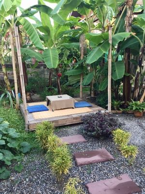 Seating in the garden at Pink House Garden in Chiang Mai