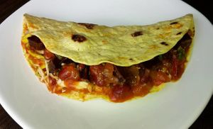 Vegan Mexican wrap, a delicious treat for the summer, with beans, vegetables, mixed salad, tomato sauce, vegan cheese & mock meat at Grannys Food in Rijswijk