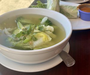 Mixed greens soup and fresh rolls  at Green Leaves in Los Angeles