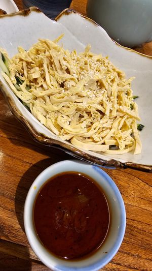 Shredded tofu and cucumber with a Szechuan chilli oil at Ye Bo Zhai in Beijing