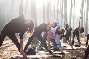 Yoga in the pine forest at Vegan Surf Camp in Moliets