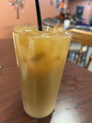 Iced pumpkin coffee with oat milk  at The Purple Rooster Cafe in Attleboro