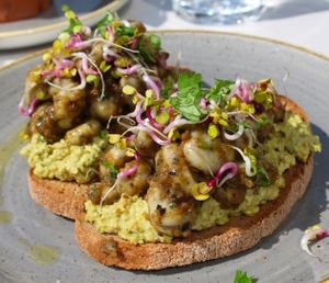 We tried Raw hummus bruschetta with green beans in aubergine sauce at Bhuti in Richmond Upon Thames