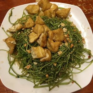 Morning glory with tofu - so yummy at Noodle & Roll in Hanoi