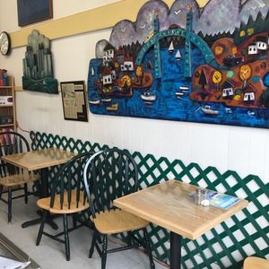 Cafe seating at John Edwards Whole Foods & Wine Cellar Art Gallery in Ellsworth