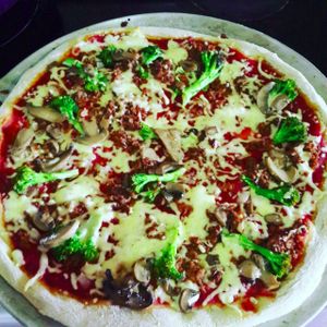 Brocolis pizza. at Veggies Pizza in Alajuela