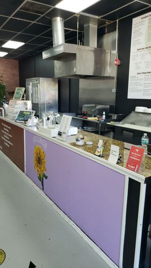Order and go. 1 table to dine at at Splurge Juice Bar and Cafe in Hialeah
