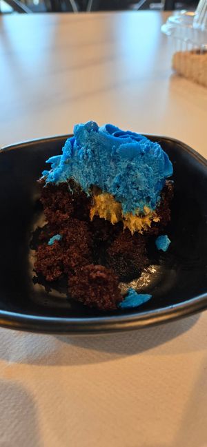 Vegan cookie monster cupcake. Chocolate GF cupcake with cookie dough and blue frosting. at Mason Dixon Bakery & Bistro in Huntsville