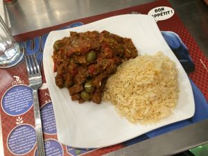 Spicy seitan and rice dish at Vegan Hero in Paris