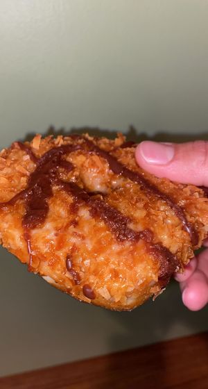 Caramel Delight Doughnut (Deluxe Flavor). at Dottie's Donuts - Springfield Ave in Philadelphia