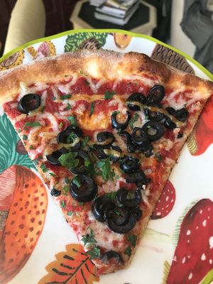 Light vegan cheese, fresh garlic and black olives  at Amici's East Coast Pizzeria in San Mateo