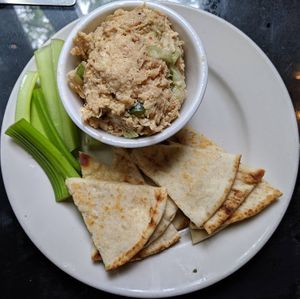 Vegan Chicken Salad Appetizer:  House-made vegan chicken salad (with scallions, cucumbers, vegan mayo) served with pita points. AMAZING! at Spotted Dog Restaurant and Bar in Carrboro