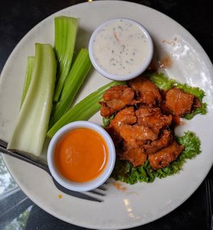 Veggie Wings: NC soy chicken nuggets served plain, tossed mild, or tossed hot with a side of hotter sauce and vegan ranch. These are INCREDIBLE! at Spotted Dog Restaurant and Bar in Carrboro