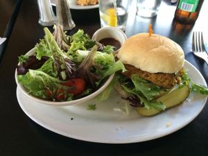 curry quinoa burger with side salad at Spotted Dog Restaurant and Bar in Carrboro
