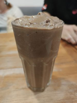 Smoothie with cacao, peanut butter, banana, cinnamon, almond, and coconut milk at Food4Thought in Chiang Mai
