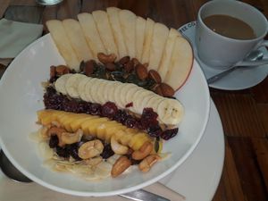 Granola with soy milk, packed with fruit and nuts, veganised on request at Food4Thought in Chiang Mai