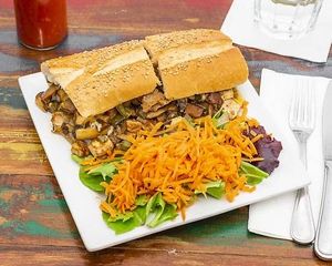 Philly Hero
Sautéed seasoned seitan, mushrooms, tofu, green peppers, onions, mozzarella, cheddar, and mayo. at VSpot in Brooklyn