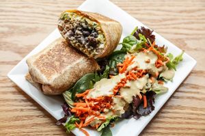 Vspot Burrito
Carne molida, guacamole. Caribbean brown rice medley, vegan cheddar, peppers, red beans, VSPOT sour cream, salsa roja, and pico de gallo in a whole wheat wrap.

 at VSpot in Brooklyn