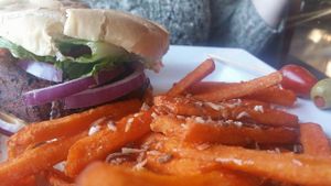 One of two vegan burgers on the menu, with sweet potato fries at Venti's Cafe and Taphouse in Salem