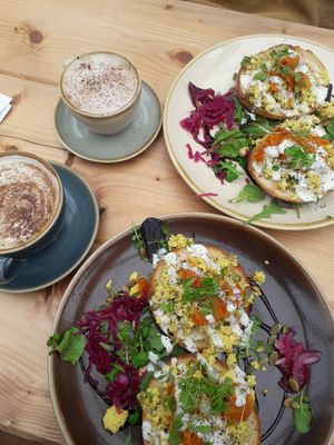 Bagels with tofu scramble and carrot, chai latte, cappuccino at Bonobo Cafe in Aberdeen