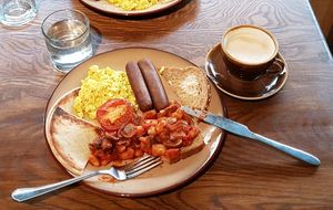 The big breakfast plate and an oat milk cappuccino at Bonobo Cafe in Aberdeen
