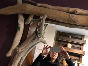 Bathroom mirror with reclaimed wood. at Bonobo Cafe in Aberdeen