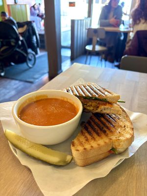 Cajun “CHN” Club panini w/ roasted red pepper soupp which  at Abbey Cafe and Gallery in Fredericton