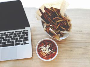 Oven-baked fries (very nice and crispy, even when cold) and chilli quinoa with daiya cheese at Copper Branch - Catherine O in Montreal