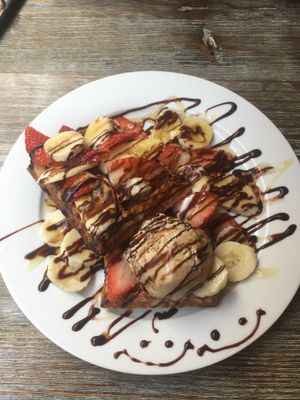 Waffle with chocolate ice cream and strawberries  at LN Fortunate Coffee in Hong Kong Island