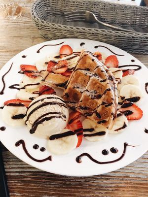 Waffles with vanilla ice cream, strawberries and banana at LN Fortunate Coffee in Hong Kong Island
