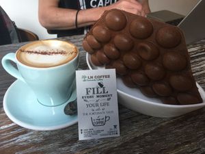 Vegan chocolate bubble waffle and vegan cappuccino at LN Fortunate Coffee in Hong Kong Island