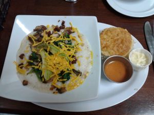 Vegan scramble on top of grits at Good Karma Coffee House in Decatur