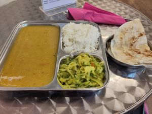 Daily lunch with a side paratha at Thenga Cafe in London