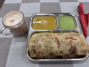 Stuffed with potato masala, lettuce and bhaji  at Thenga Cafe in London