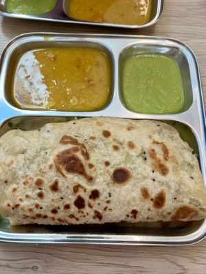 Stuffed paratha meal   at Thenga Cafe in London