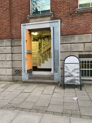 Look for this unassuming doorway  at Thenga Cafe in London