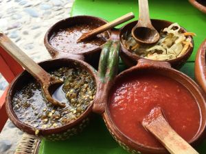 Salsas that come with the meal- VERY SPICY and delicious at Yeikame in Sayulita