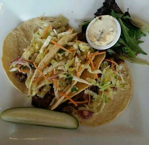 Vegan Ancho-Chili-Spiced lentils, grilled onions, roasted poblano peppers, garlic-lime slaw, poblano veganaise on corn tortillas  at Marie Catrib's in Grand Rapids