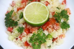 Couscous salad.
Couscous, fresh chopped tomatoes, cucumber, bell peppers, onions, parsley and deep fried eggplant. Staffed with olive oil, salt and lime. 
 at Falafel Sihanoukville in Sihanoukville