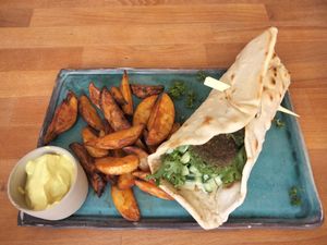 Falafel wrap with wedges & aioli at Zwei und Zwanzig in Geisenheim