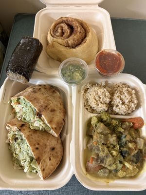 musubi, cinnamon roll, green curry and pita falafel  at Umeke Market in Honolulu