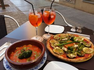 Pumpkin ravioli and pizza! Both very delicious. Enjoyed the Aperol Spritz too :)  at San Andrea  in Gran Canaria
