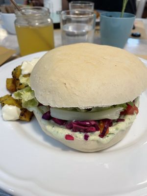 Falafel Burger with fries  at Dulcamara Bio Vegan Bistrot in Verona