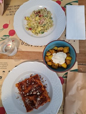 Vegan lasagna and potatoes with veg mayo at Dulcamara Bio Vegan Bistrot in Verona