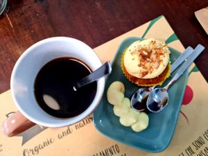 Carrot cupcake and coffee at Dulcamara Bio Vegan Bistrot in Verona