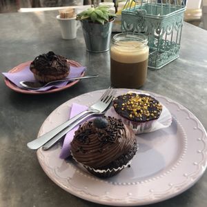 Cakes and soy milk ice coffee. All delicious. at Dulcamara Bio Vegan Bistrot in Verona