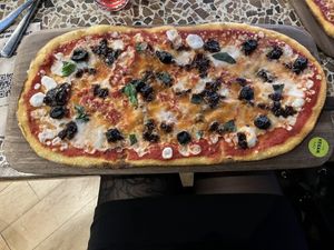 Vegan Margarita pizza with extra olives and caramelized balsamic onions Pizza  at Zizzi - Queensferry St in Edinburgh